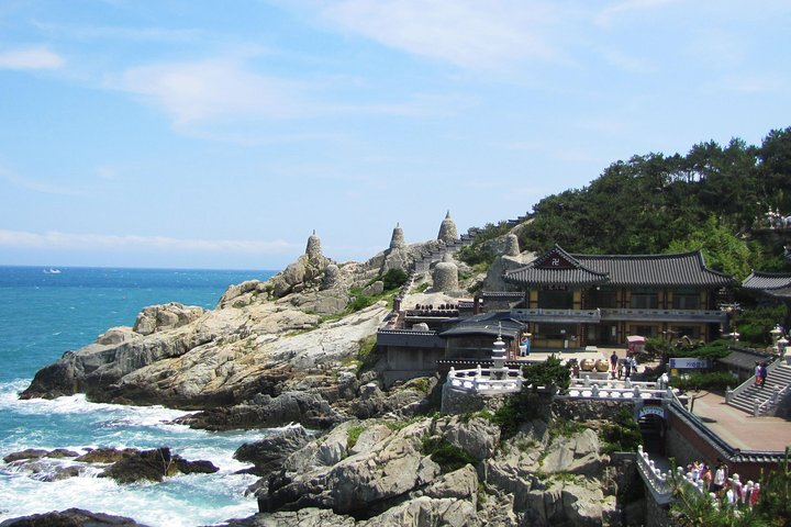 Experience the stunning coastal views at Haedong Yonggungsa Temple where ancient architecture meets the sea creating a perfect backdrop for unforgettable memories in Busan.
